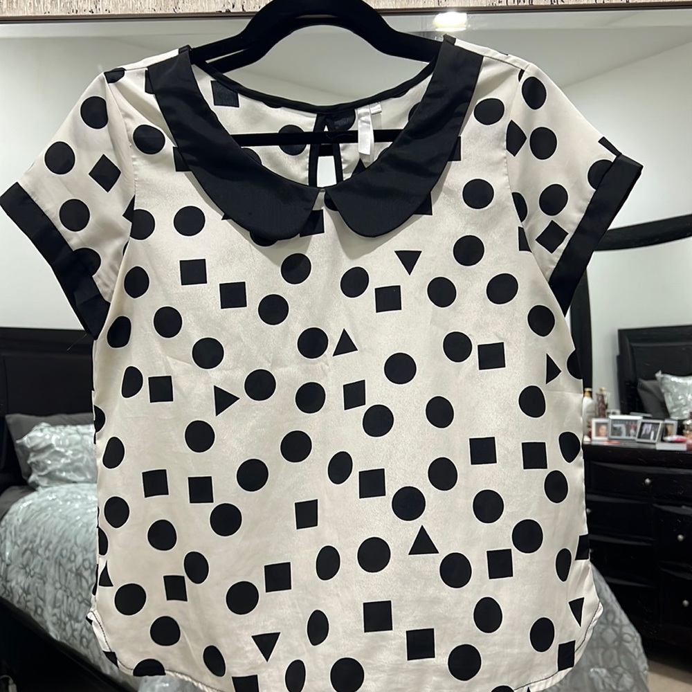 Black and cream blouse